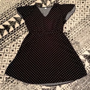 Black dress with white polka dots
